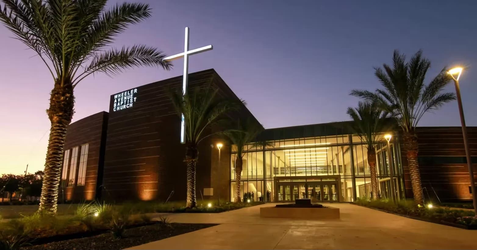 Wheeler Avenue Baptist Church exterior at dusk